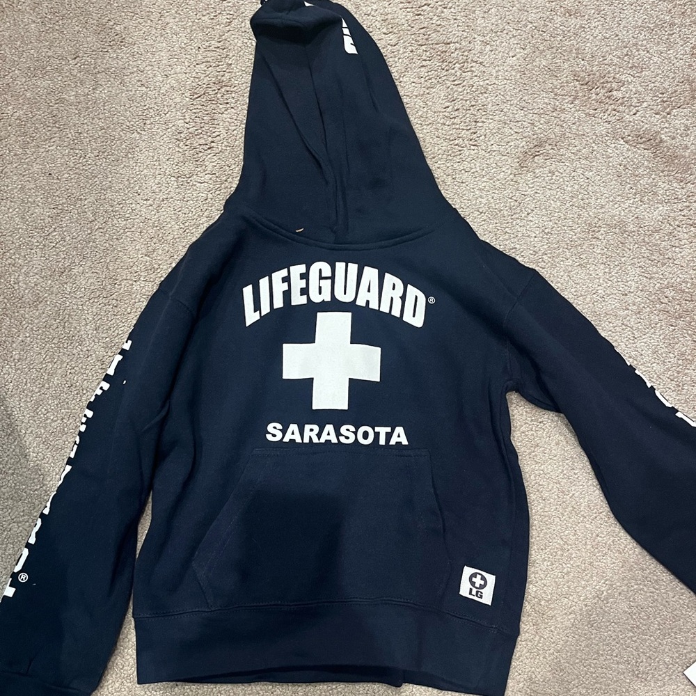 Sarasota Lifeguard SweatShirt Size 7/8. Brand new with tage